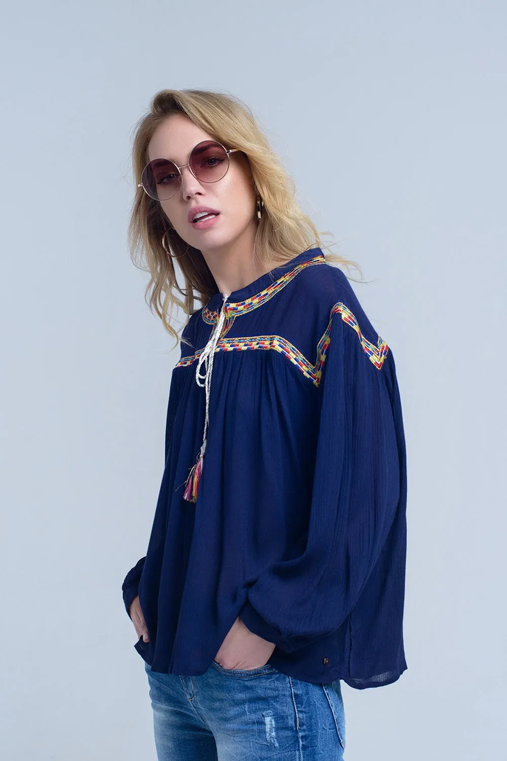 Embroidered navy blouse