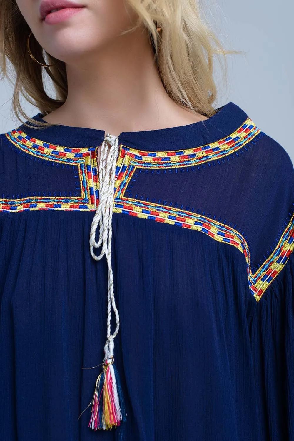 Embroidered navy blouse