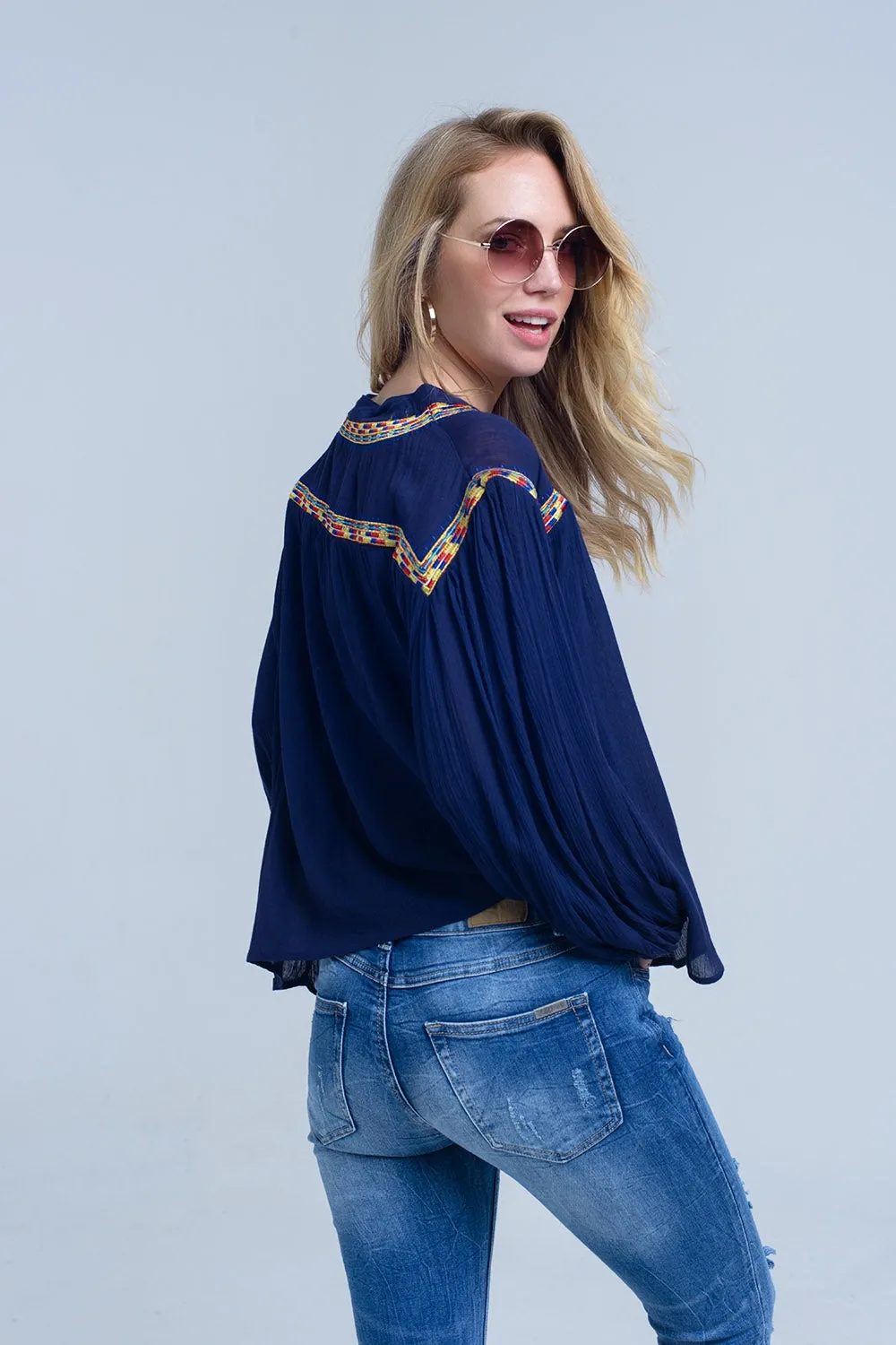 Embroidered navy blouse