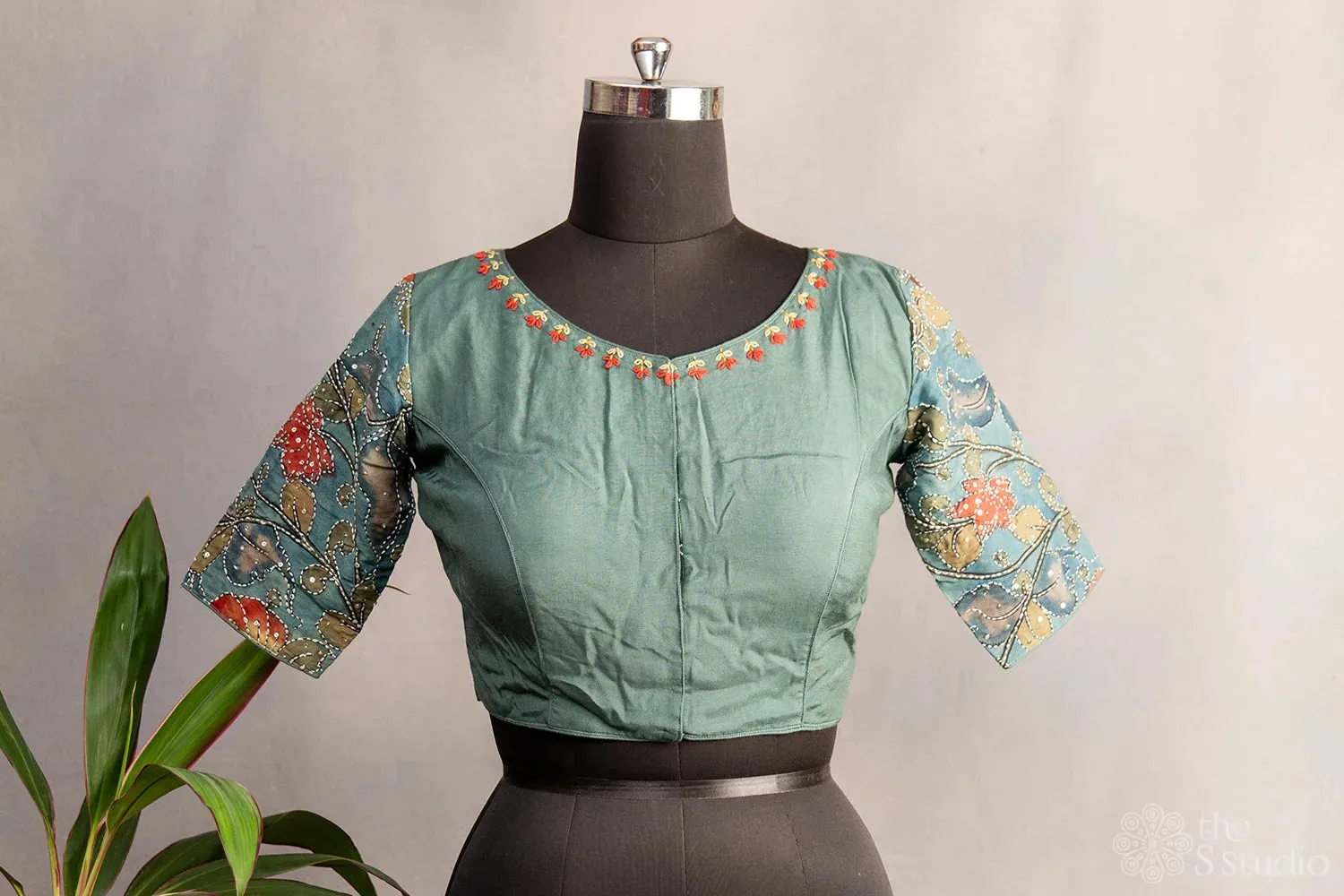 Pastel green embroidered silk blouse with kalamkari hand painted sleeves